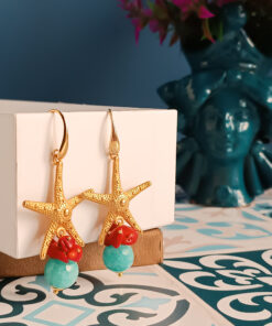 Orecchini pendenti con stelle marine e corallo rosso