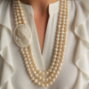 Collana a Tre Fili con Perle di Fiume e Cammeo Conchiglia Sardonica