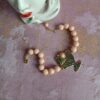 Bracciale con pietre rosa e pesciolino 3