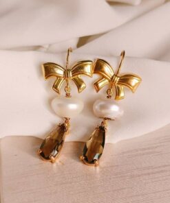 Orecchini a fiocco con perle e cristalli grigi 1