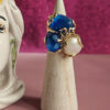 anello triplo con occhio di gatto blu e perla piatta