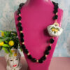collana lunga siciliana con oniccollana lunga siciliana con onice e coffa in ceramica di caltagirone