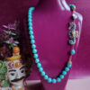 Collana siciliana in pasta di turchese con cavalluccio in ceramica di caltagirone