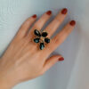 Anello a fiore con occhio di gatto nero