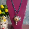 collana extra lunga con cristalli azzurri e pesce in ceramica di caltagirone