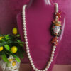 collana siciliana con perle di fiume e testa di moro in ceramica di caltagirone