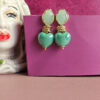 orecchini sugar con cuori in ceramica verde menta e occhio di gatto verde