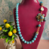 collana lunga siciliana con pietre angelite e pesciolone in ceramica di caltagirone