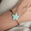 bracciale a corda con stella marina in ceramica di caltagirone dipinta a mano