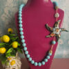 collana lunga siciliana con pasta di turchese e stella marina in ceramica di caltagirone