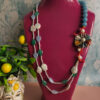collana multifilo con pietre colorate perle piatte e fiore in ceramica di caltagirone