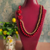 collana scarlet con pietre rosse perle oro e rose rosse