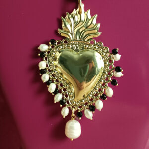 collana a corda con ciondolo cuore sacro