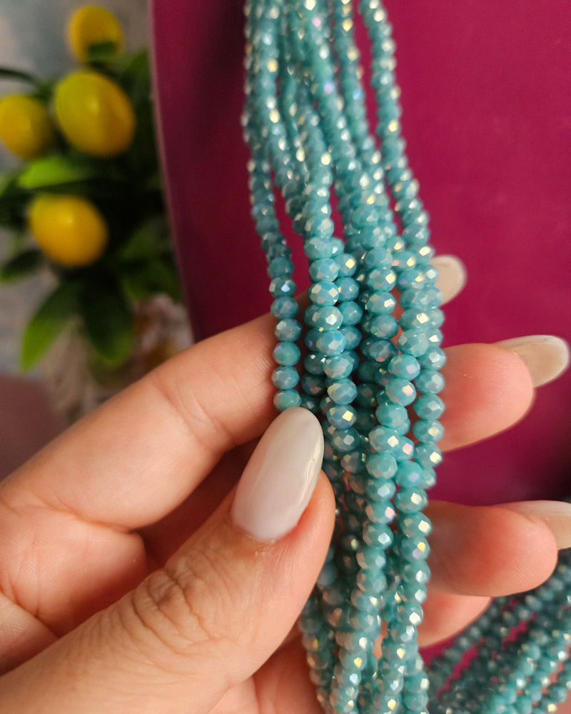 collana cristalli azzurri con pesce in ceramica di caltagirone