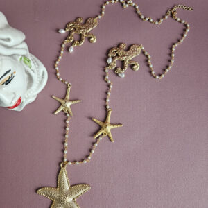 collana a catena rosario con perle e connettori oro stella marina polpo