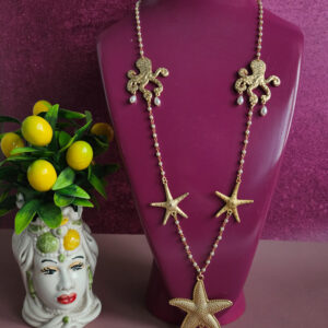 collana a catena rosario con perle e connettori oro stella marina polpo