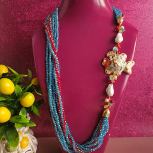 collana lunga 8 fili con cristalli azzurri e pesce in ceramica di caltagirone