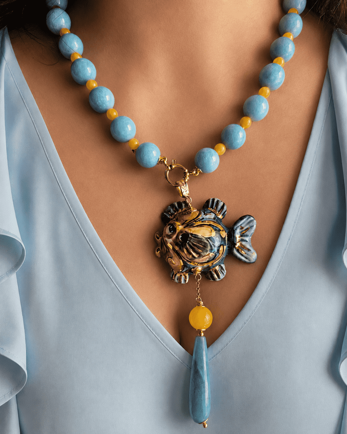collana siciliana con angelite giada gialla e pesce in ceramica di caltagirone collana siciliana con angelite giada gialla e pesce in ceramica di caltagirone
